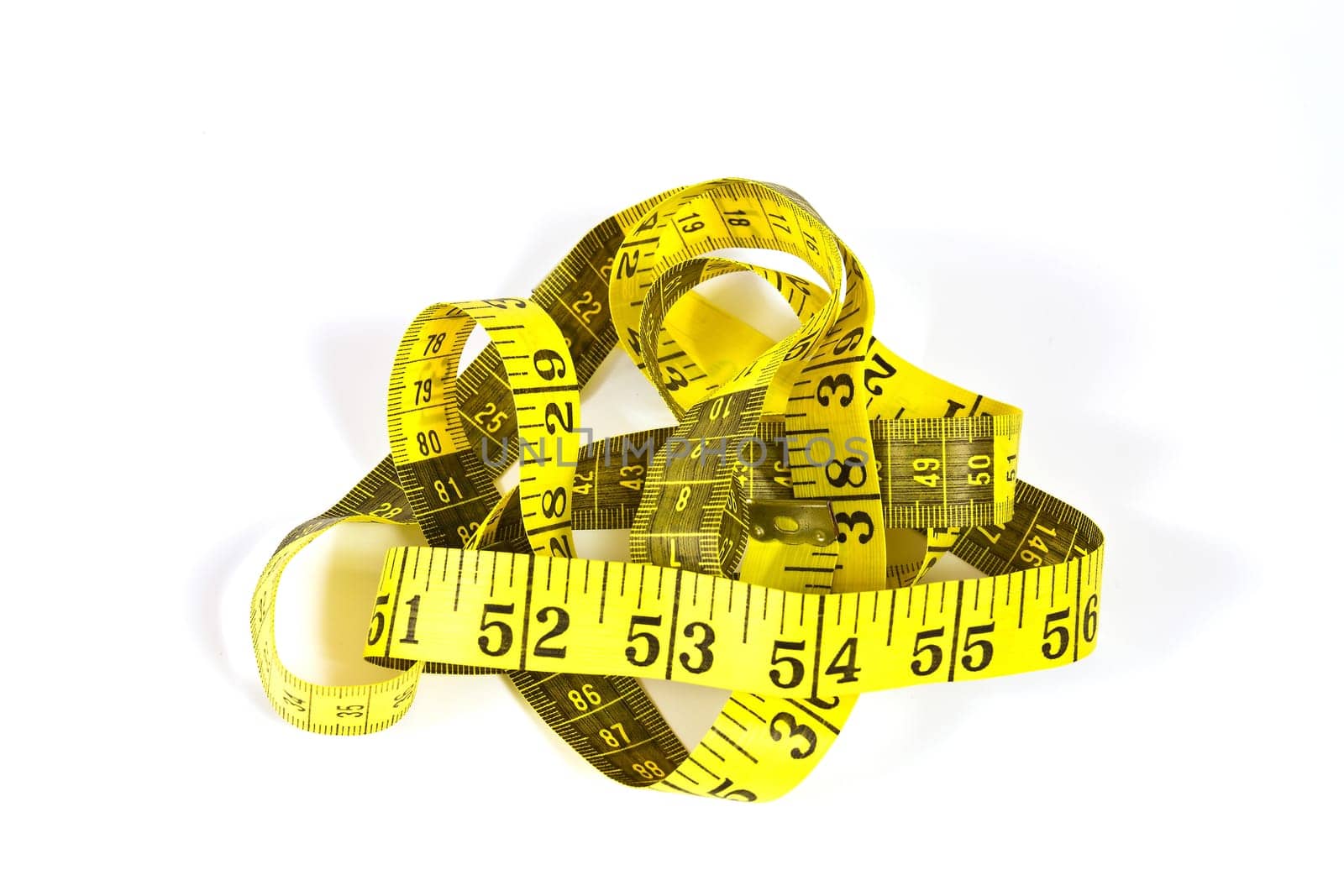 Tape measure with inch and centimeter scale on a white background