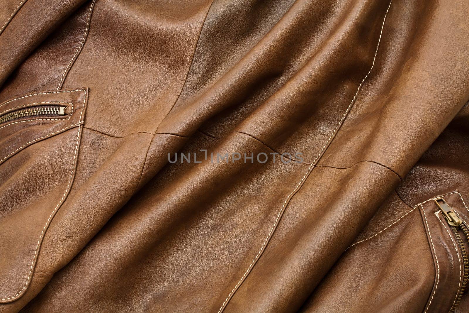 Detail of light brown leather clothing with a distinctive color and texture