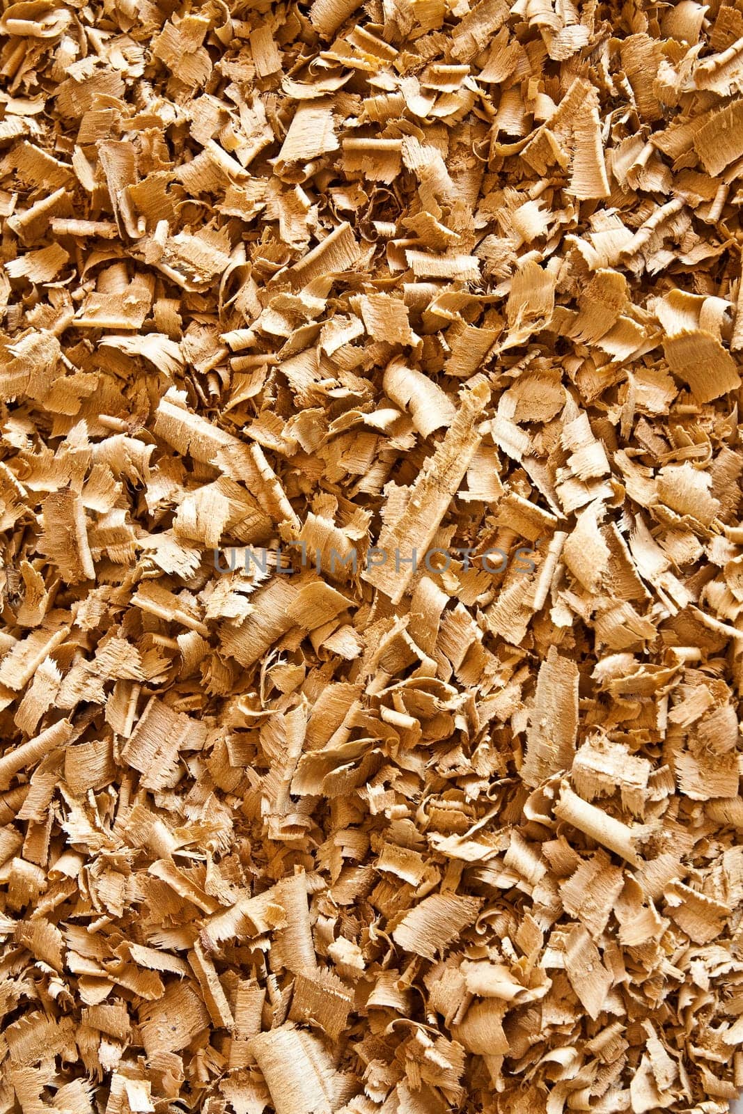 Solid surface bulk shredded waste wood shavings