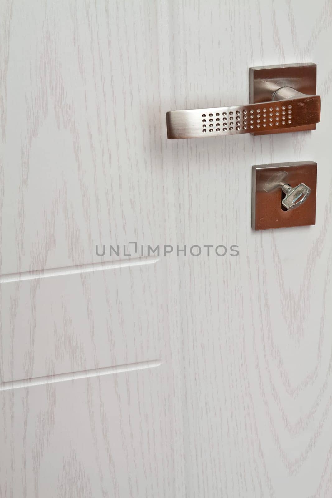 Modern metal hardware for interior doors in a geometric shape