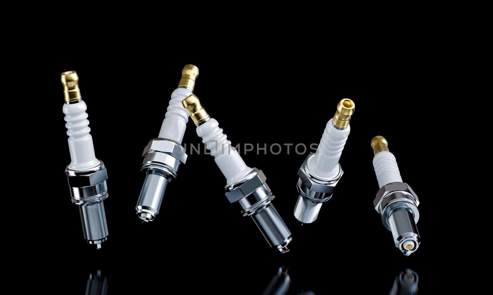 brand new spark plugs falling against a black background