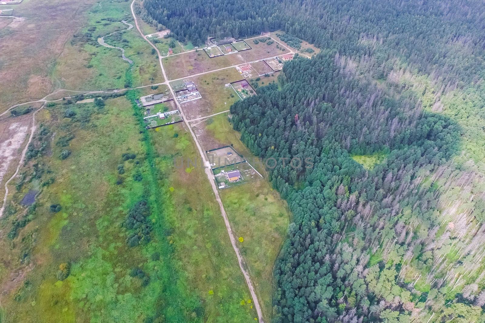 Top view of the village, fields and forests near the village