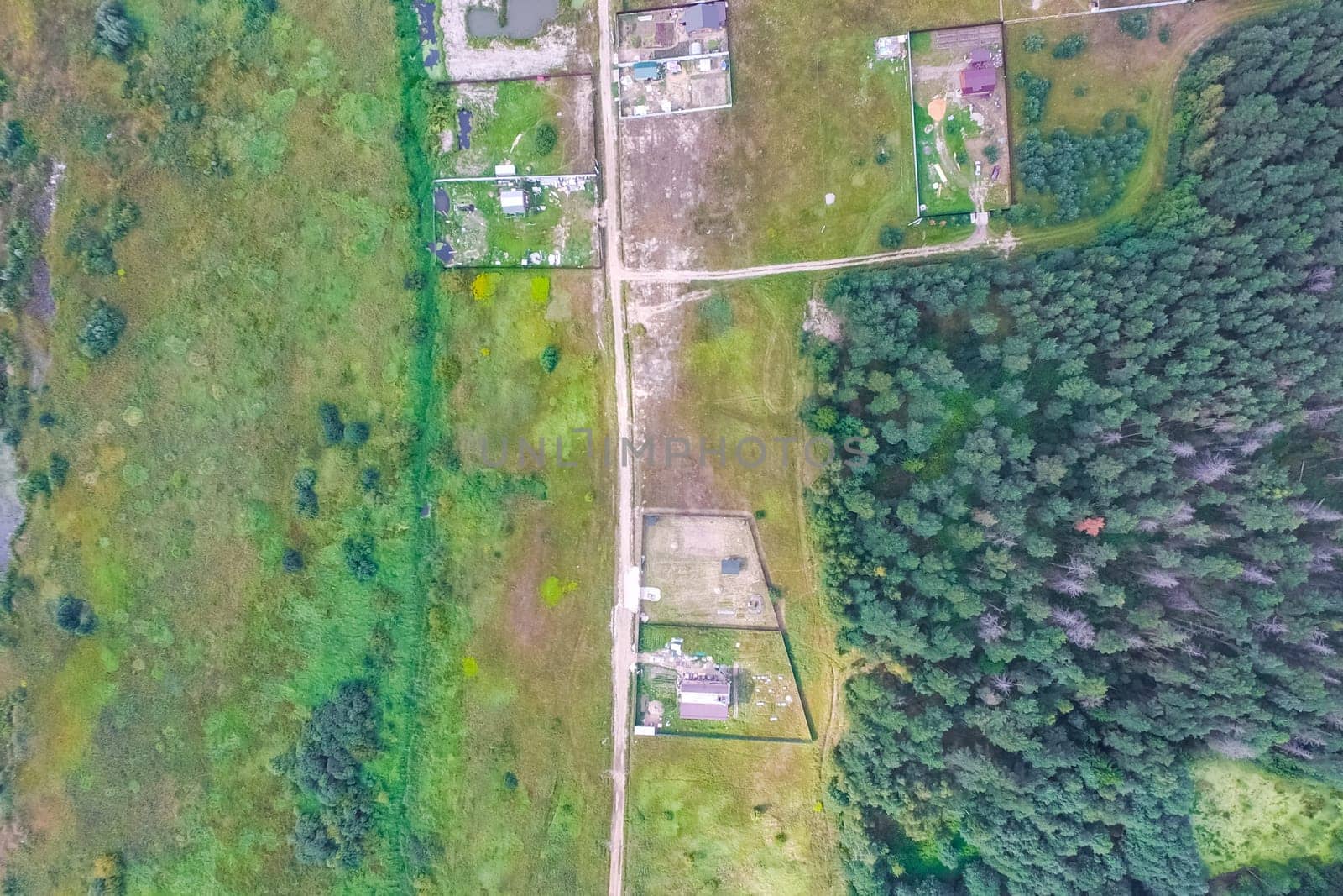Top view of the village, fields and forests near the village