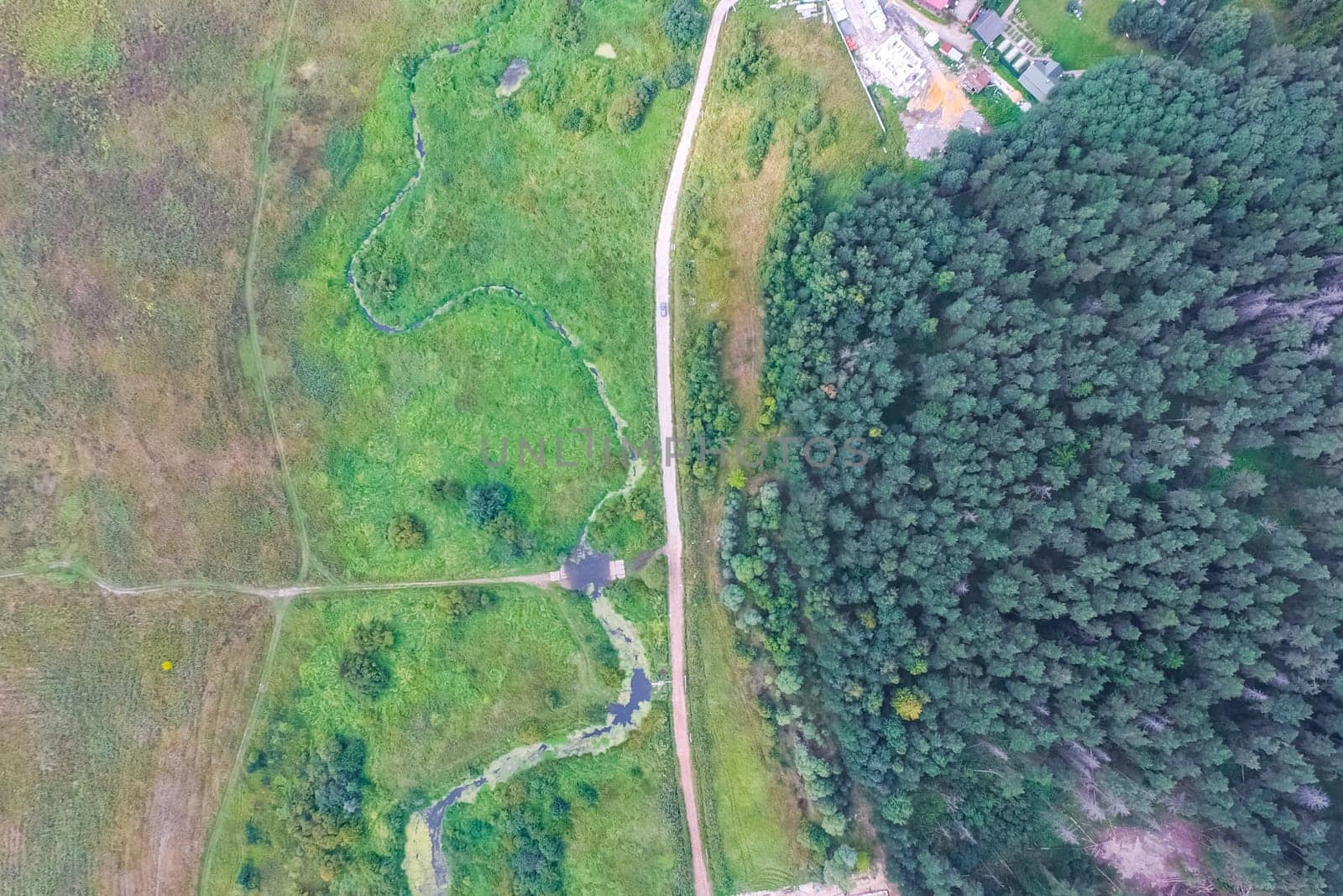 Top view of the village, fields and forests near the village
