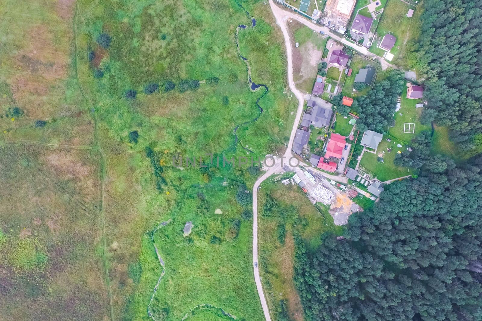 Top view of the village, fields and forests near the village