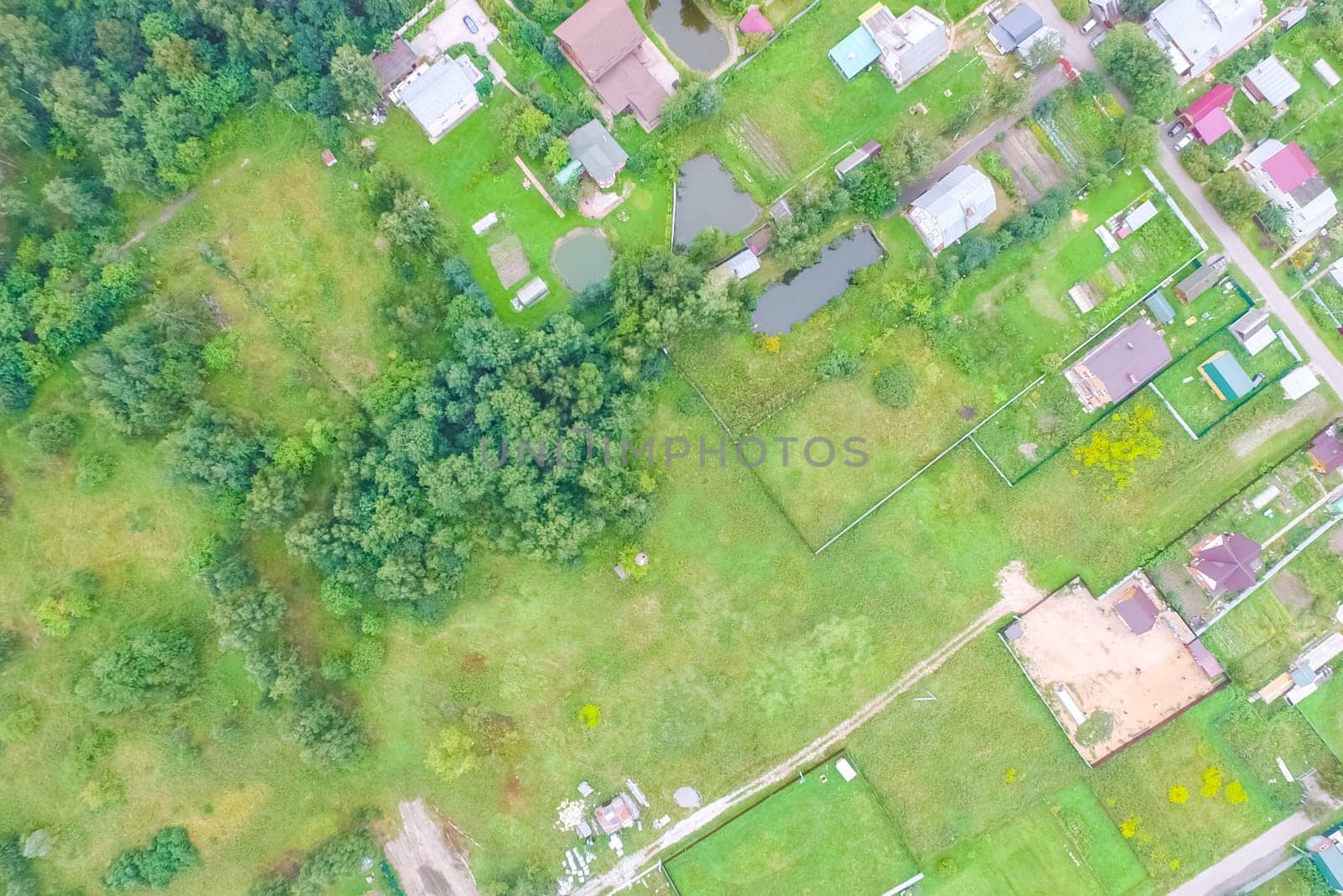 Top view of the village, fields and forests near the village