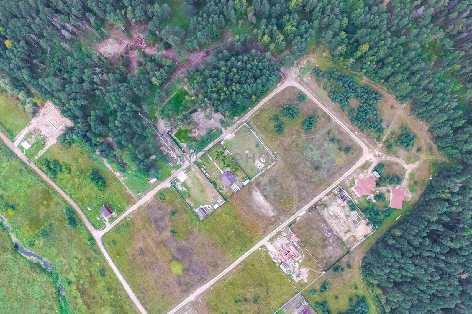 Top view of the village, fields and forests near the village