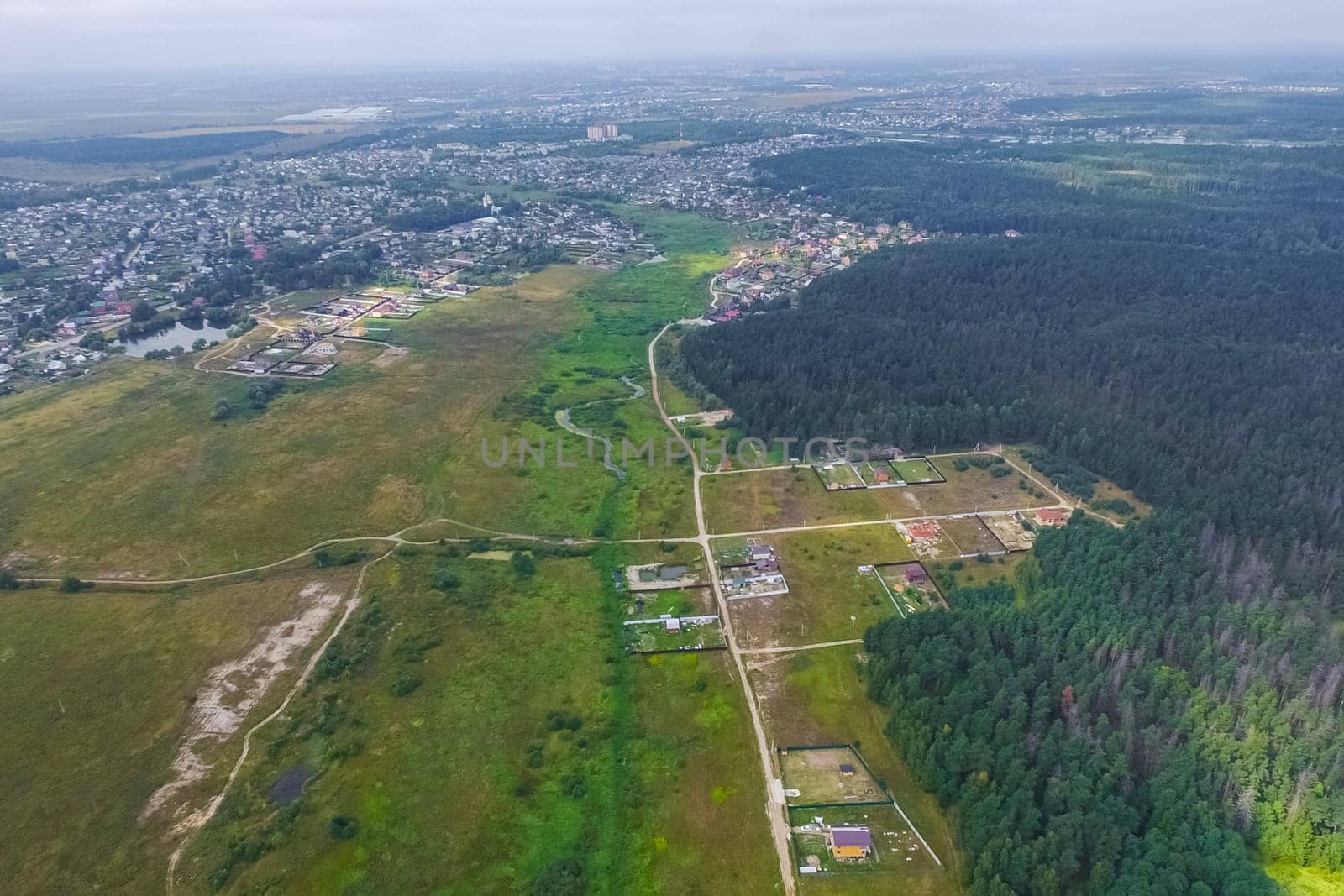Top view of the village, fields and forests near the village