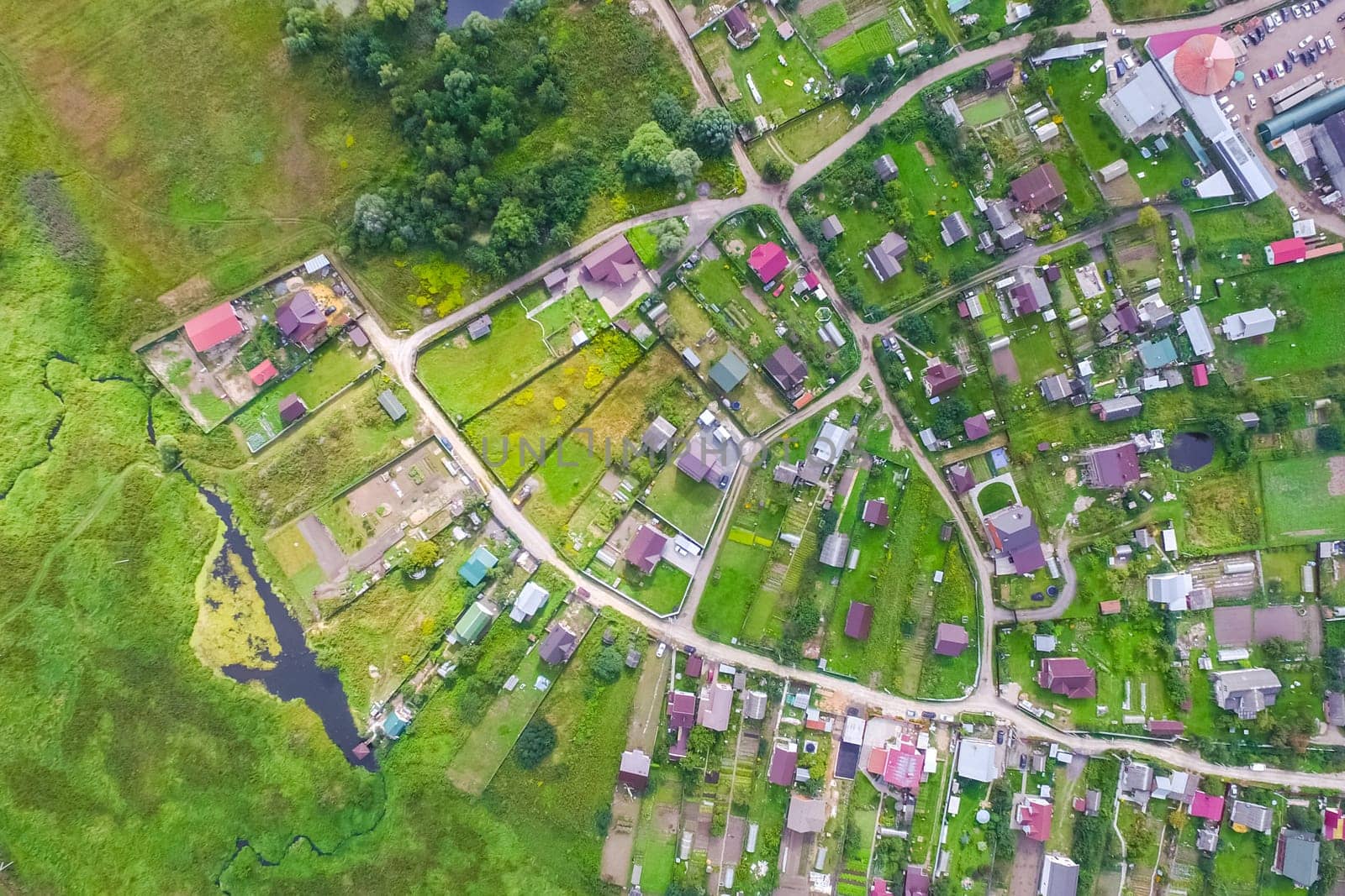 Top view of the village, fields and forests near the village