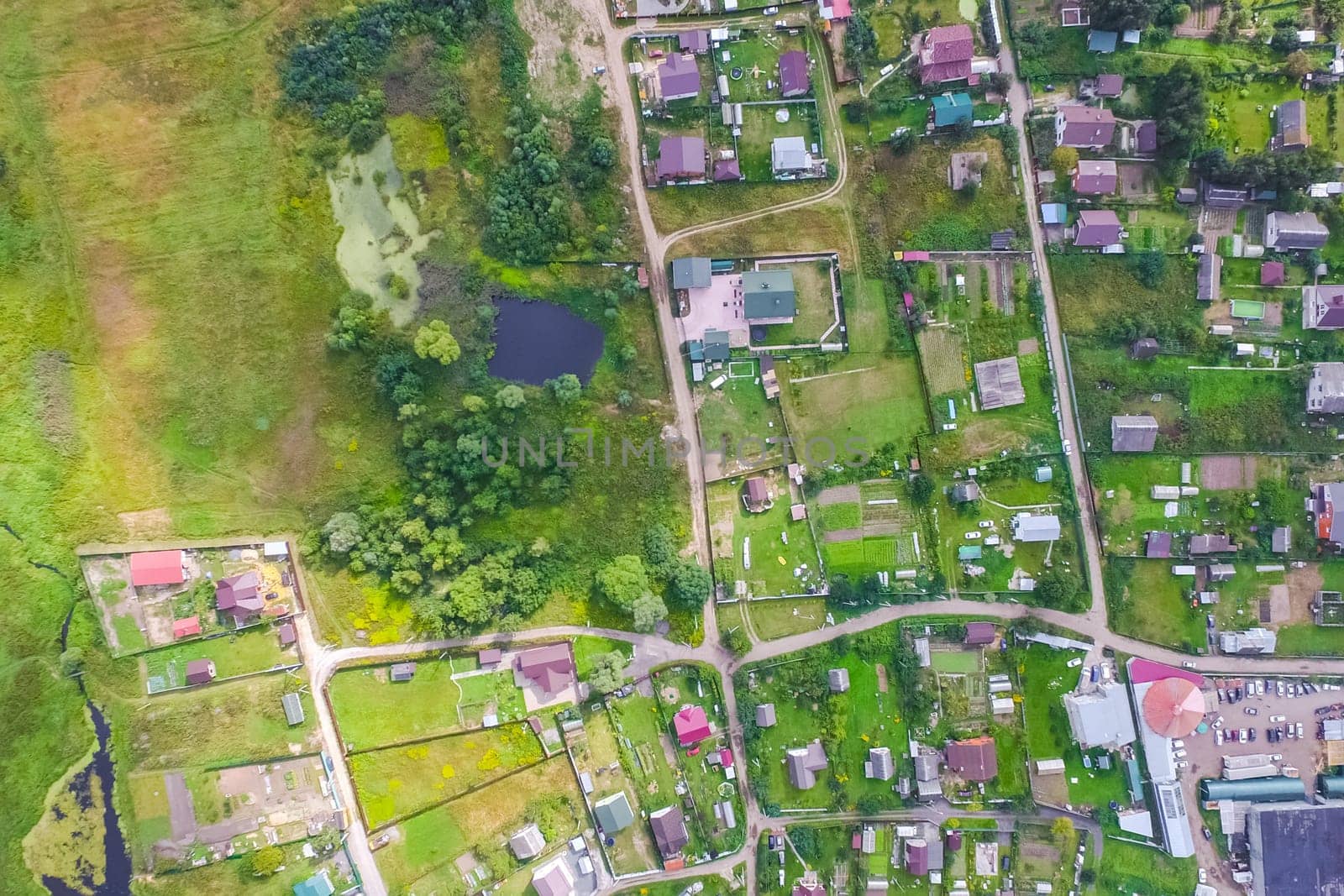 Top view of the village, fields and forests near the village