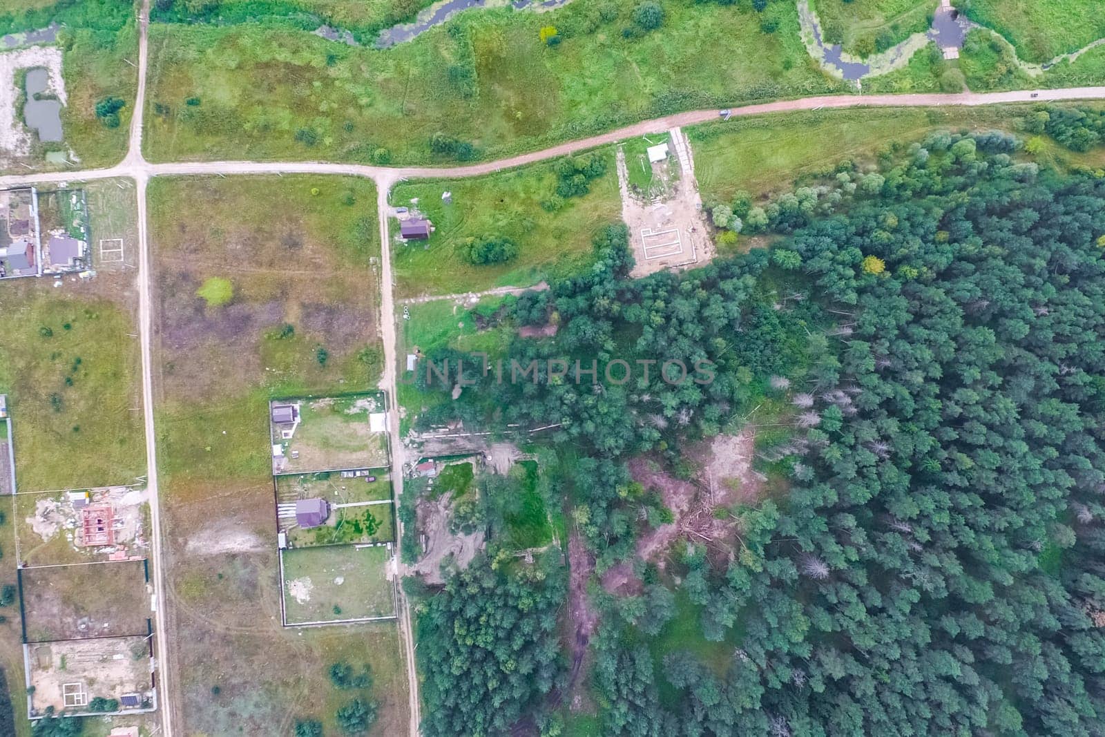 Top view of the village, fields and forests near the village