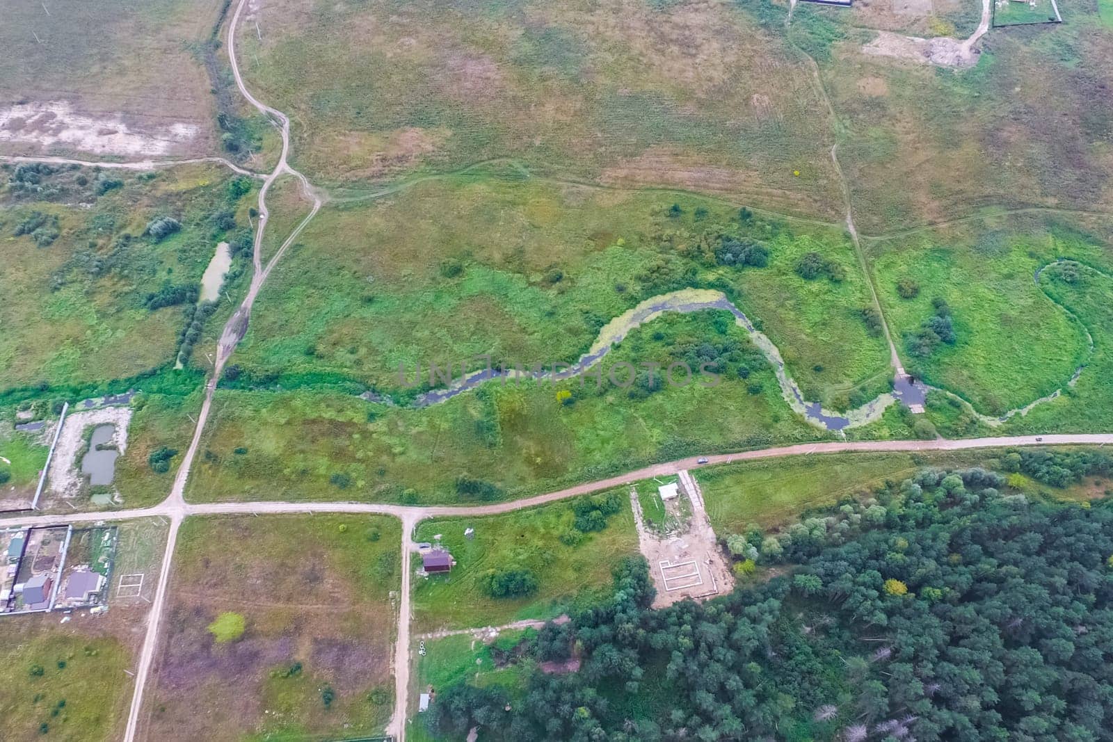 Top view of the village, fields and forests near the village