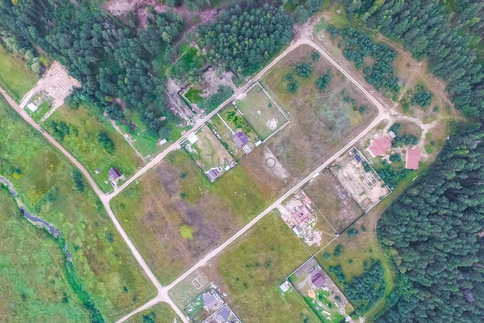 Top view of the village, fields and forests near the village