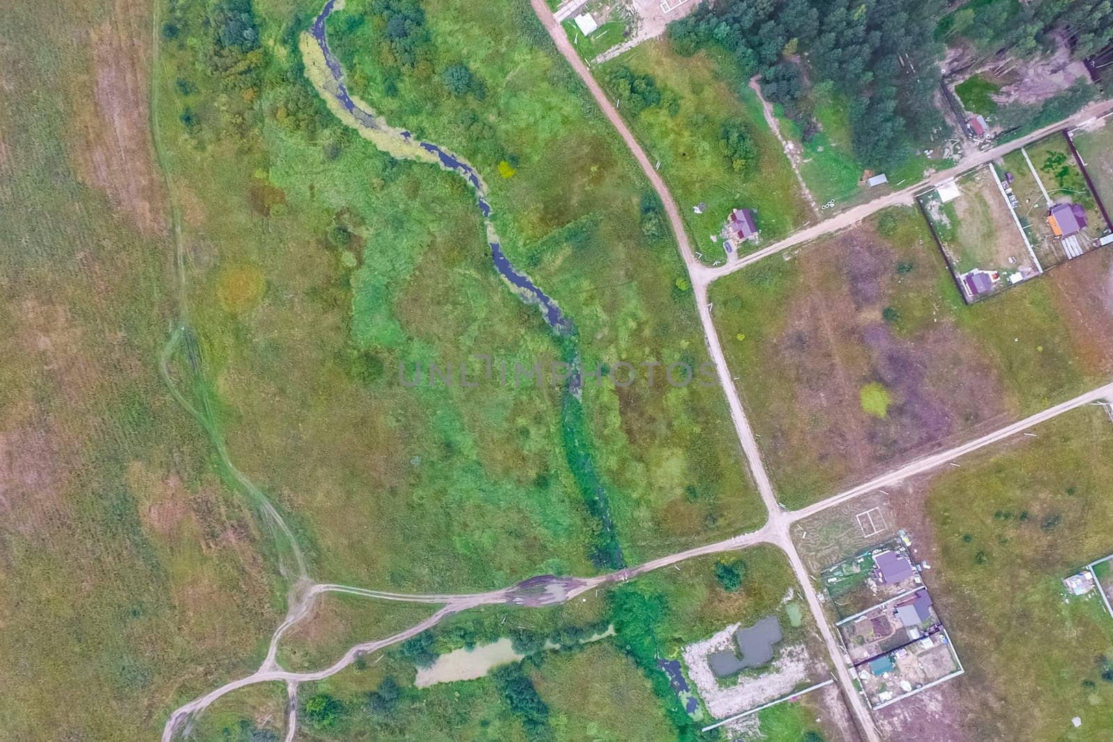 Top view of the village, fields and forests near the village
