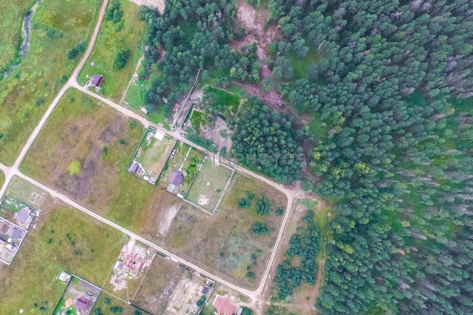 Top view of the village, fields and forests near the village