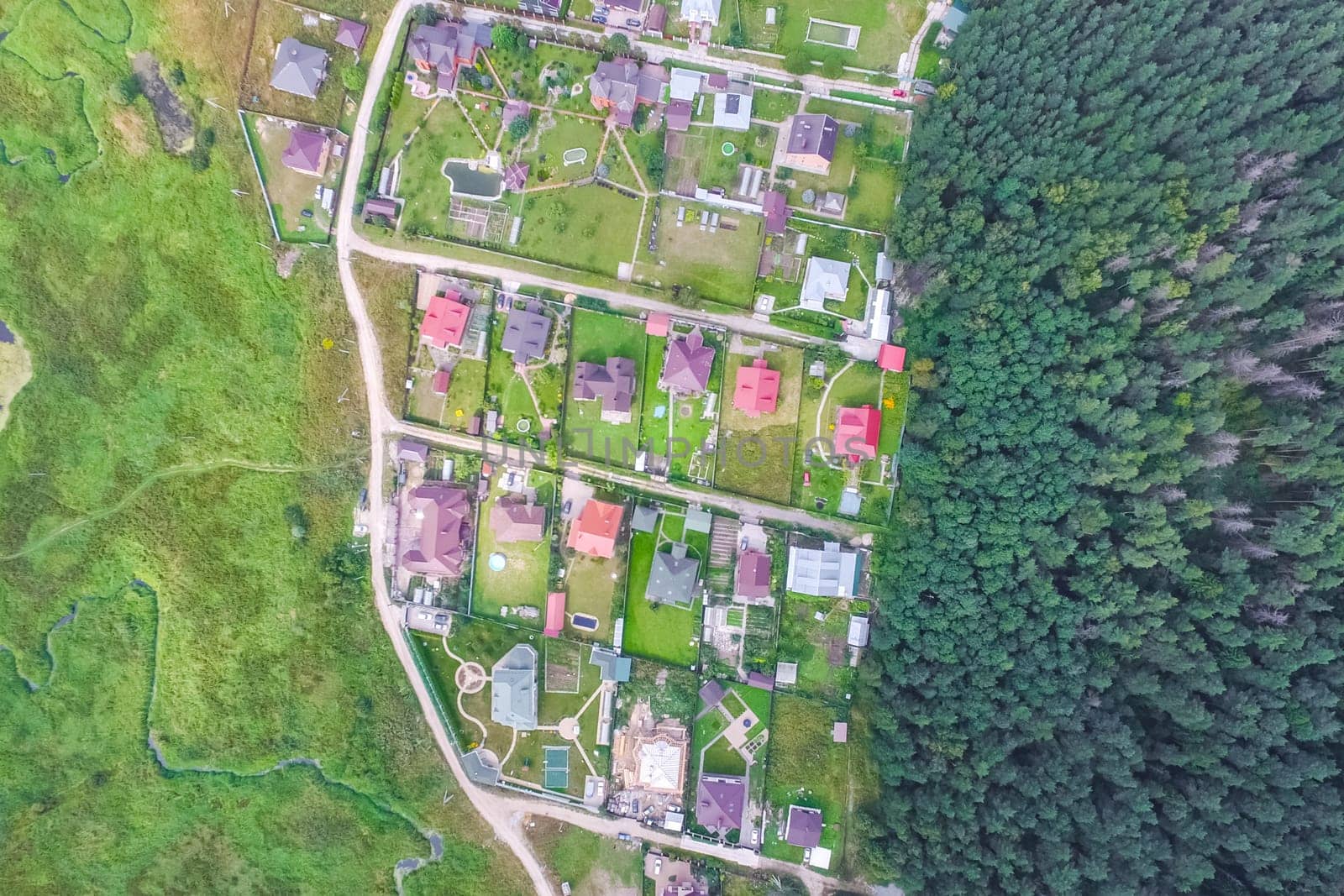 Top view of the village, fields and forests near the village