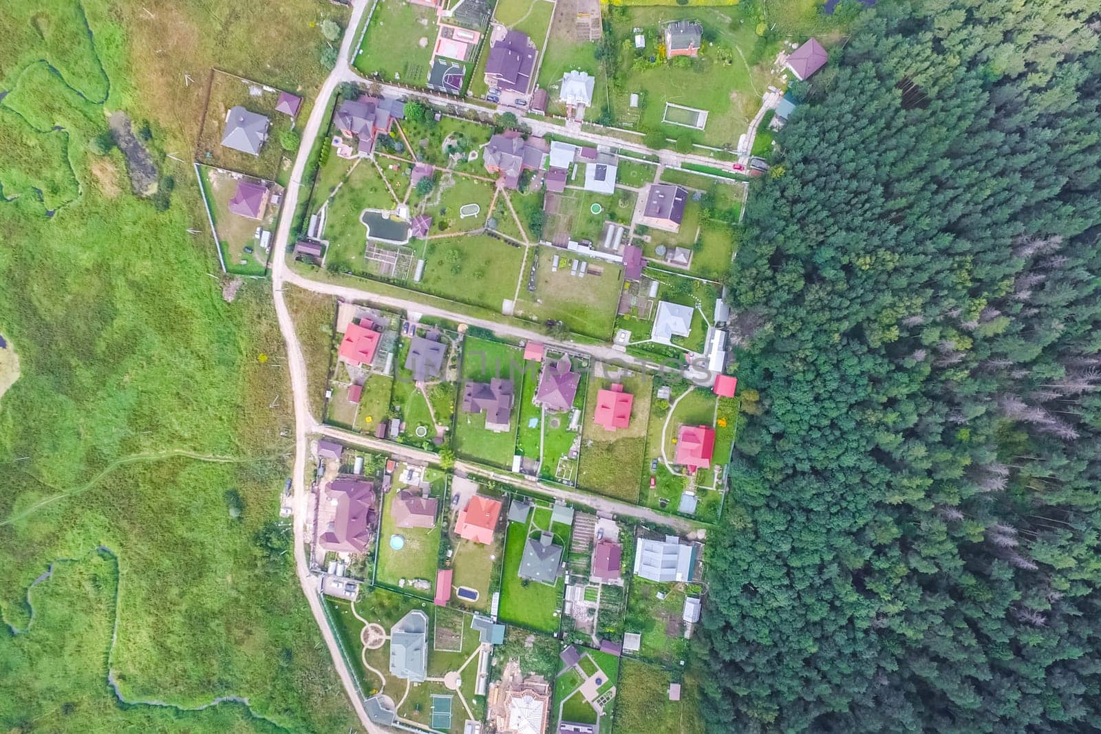 Top view of the village, fields and forests near the village