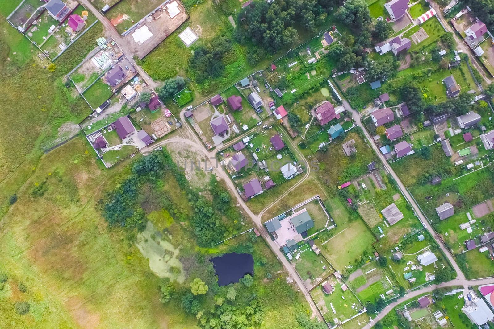 Top view of the village, fields and forests near the village
