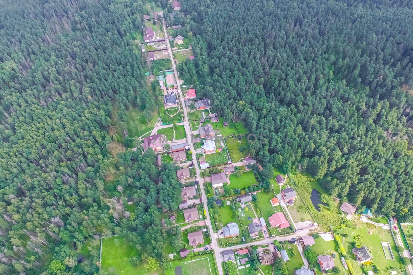 Top view of the village, fields and forests near the village