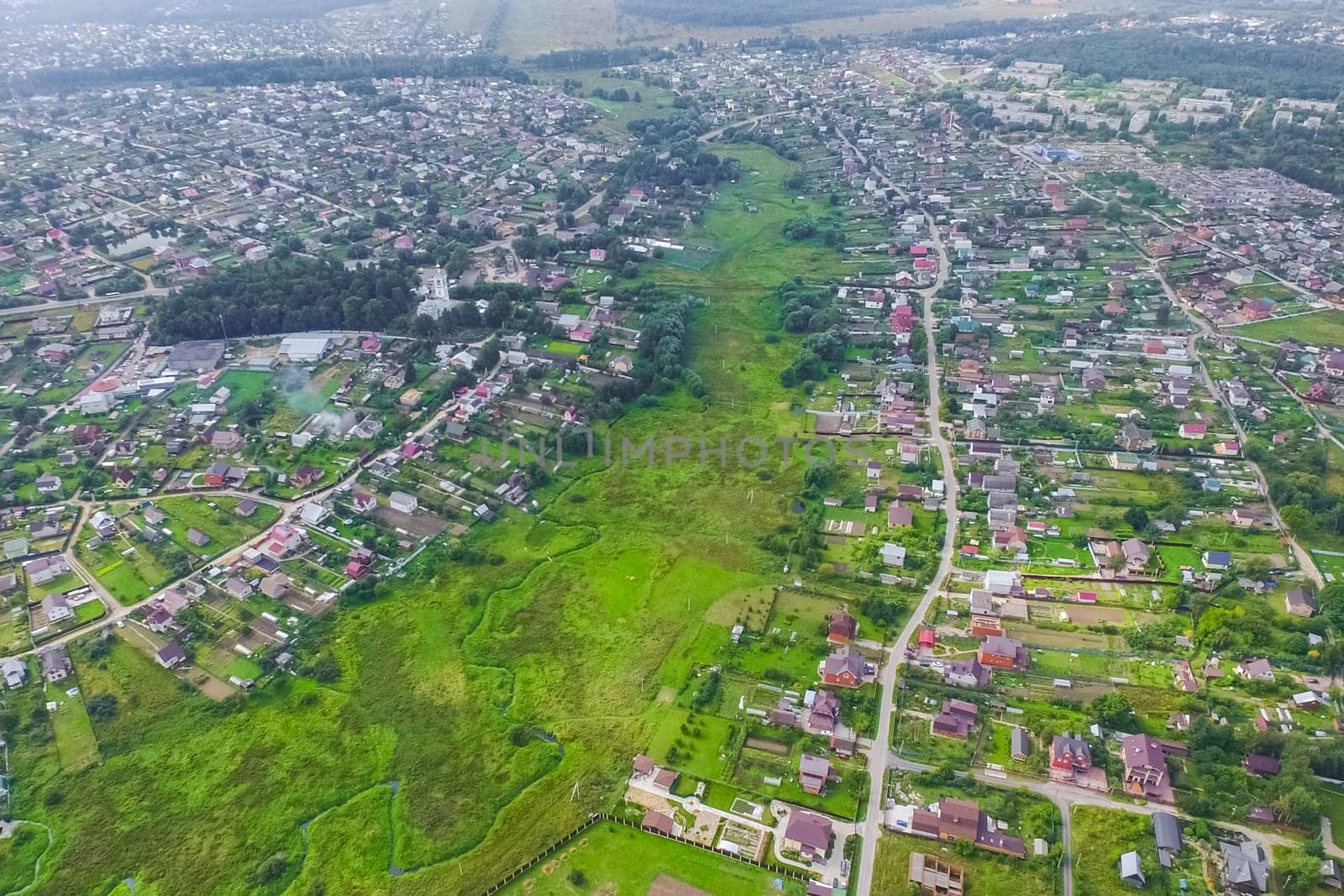 Top view of the village, fields and forests near the village