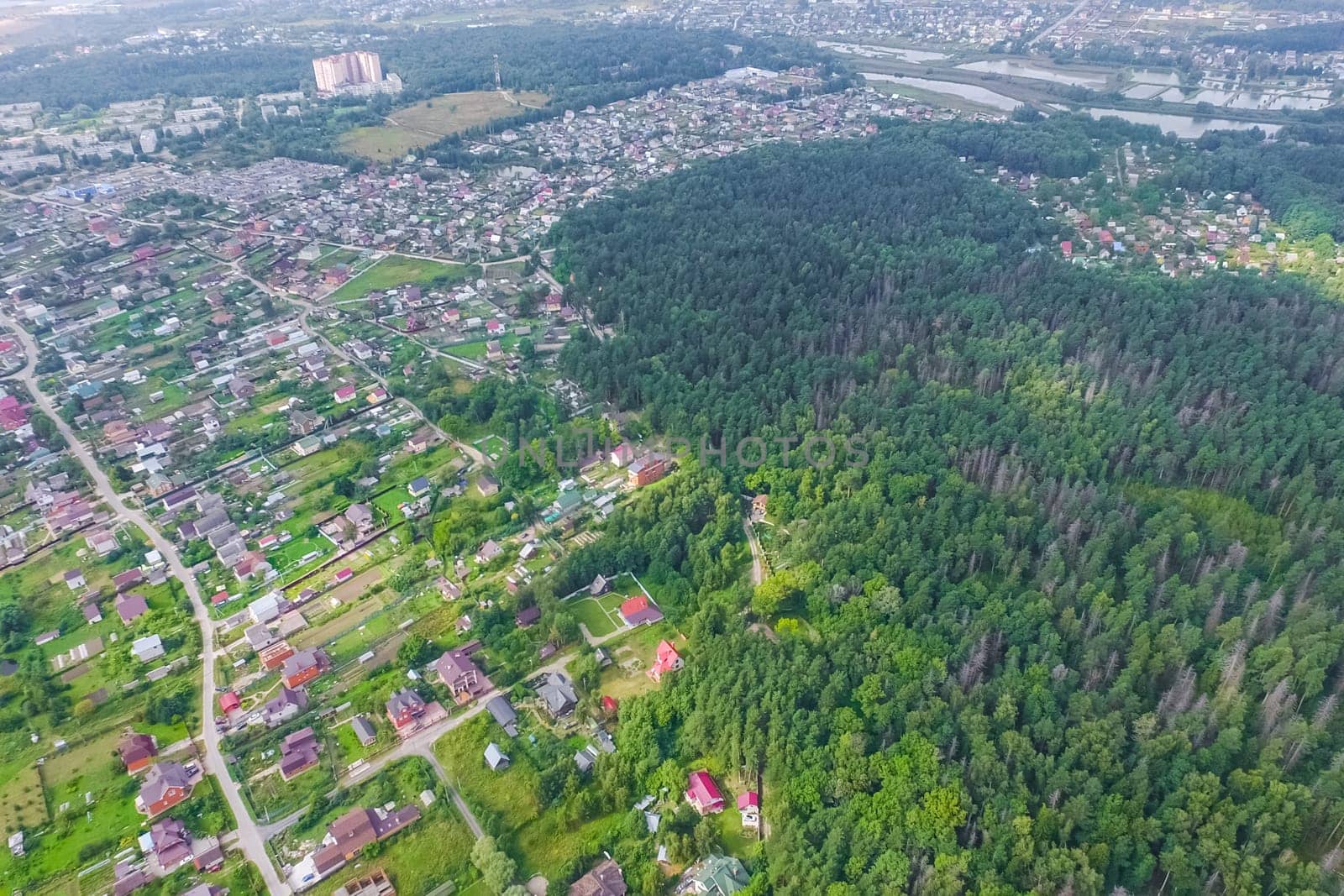Top view of the village, fields and forests near the village