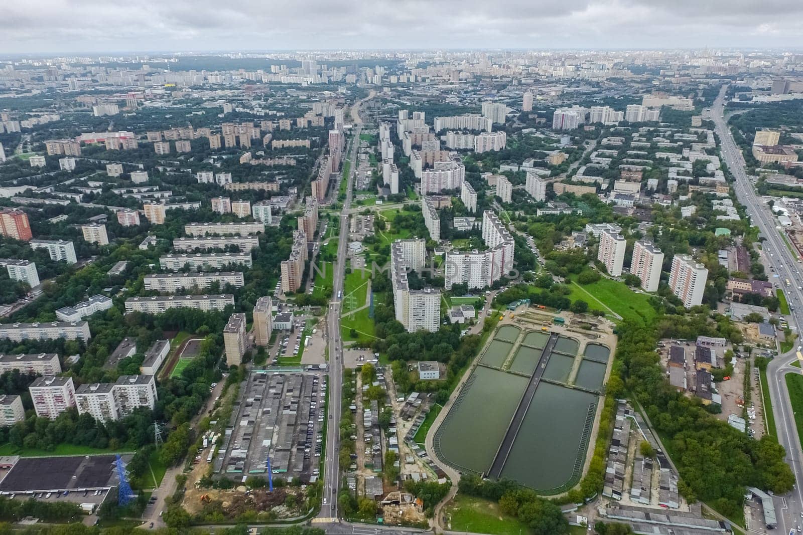 Top view of the city of Moscow, buildings and roads and other infrastructure of the city. Cityscape view from above.