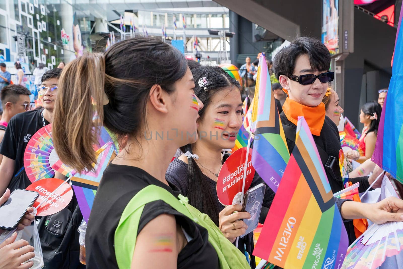 Bangkok, Thailand - JUN 1, 2024 Bangkok Pride Festival 2024, The short action and atmosphere of people joins celebrations in the event in Siam Square Bangkok, Thailand. Gender diversity There is no division of age, race or religion.