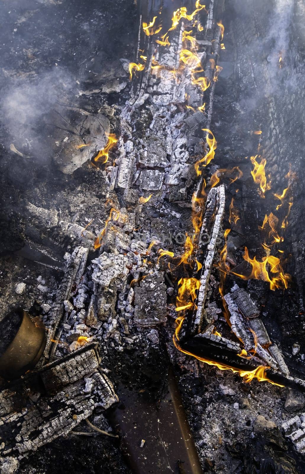 Detail of wood burning with fire and flames, destruction