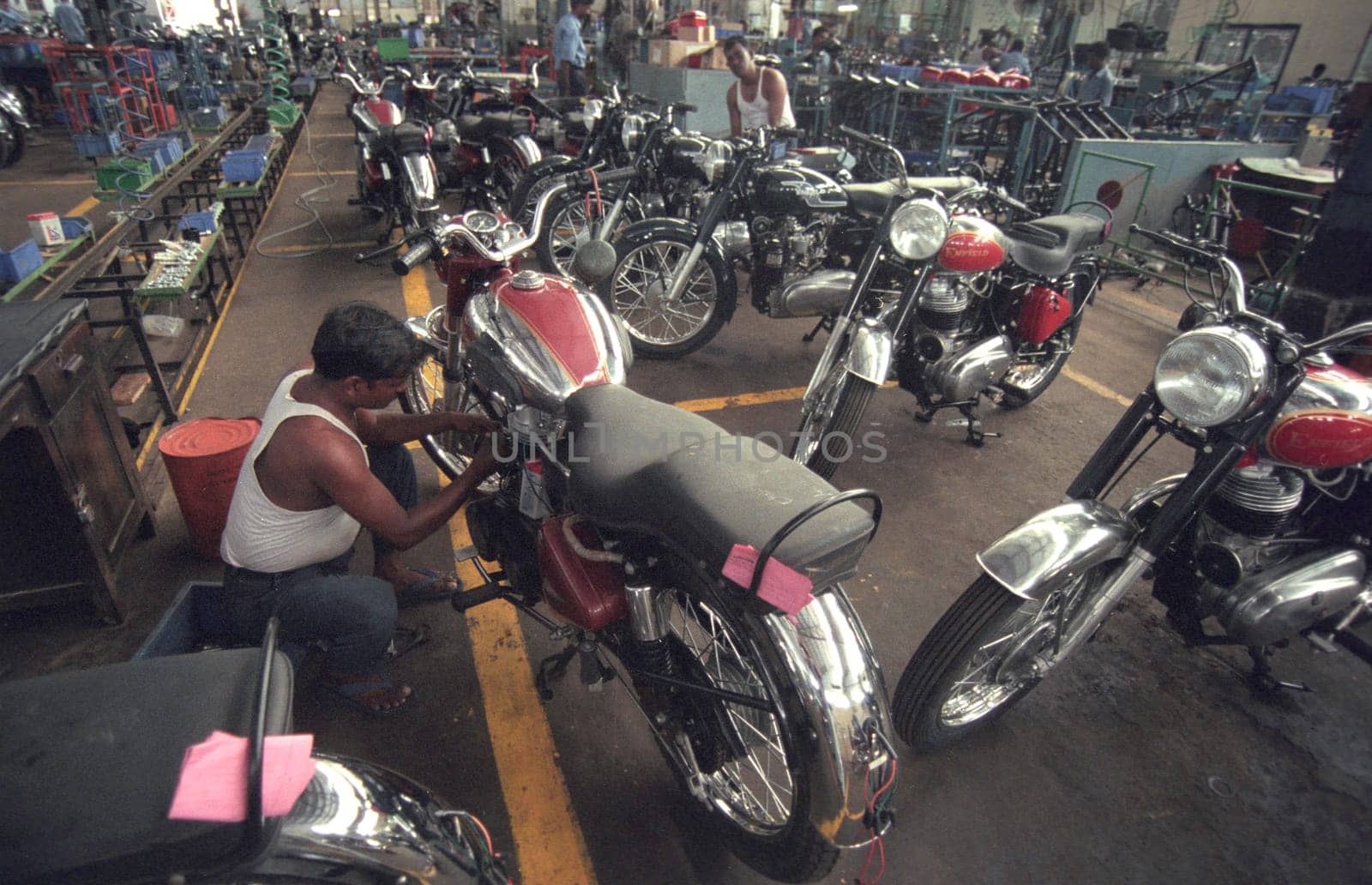 Worker at the Motorcycle Factory of Royal Enfield in of Chennai in the Province Tamil Nadu in India.  India, Chennai, April, 1998