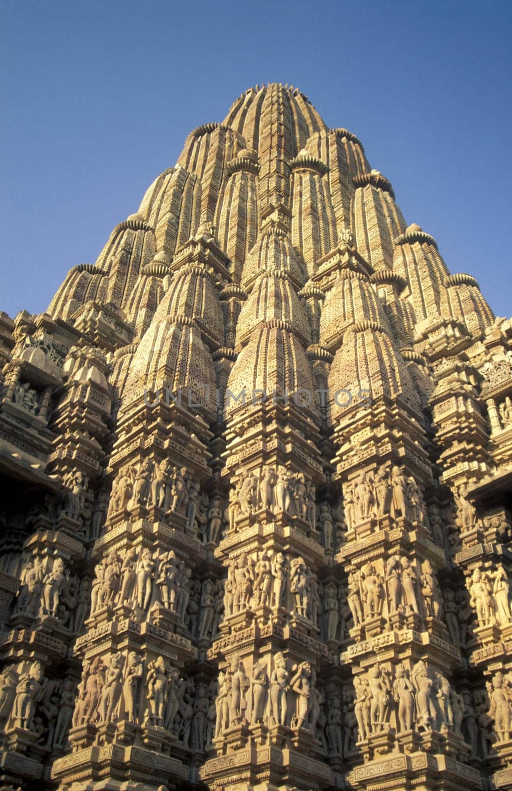 a view of the Erotic Temple and Hindu Temple of Kandarija Mahadeva Temple in the city of Khajurao in Province Madhya Pradesh in India.  India, Khajurao, April, 1998