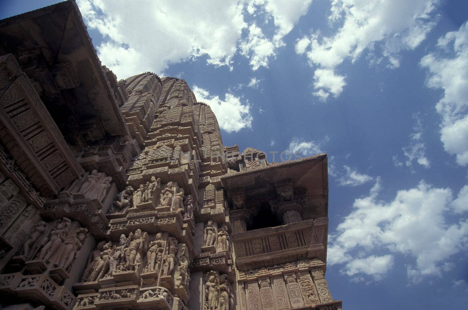 a view of the Erotic Temple and Hindu Temple of Kandarija Mahadeva Temple in the city of Khajurao in Province Madhya Pradesh in India.  India, Khajurao, April, 1998