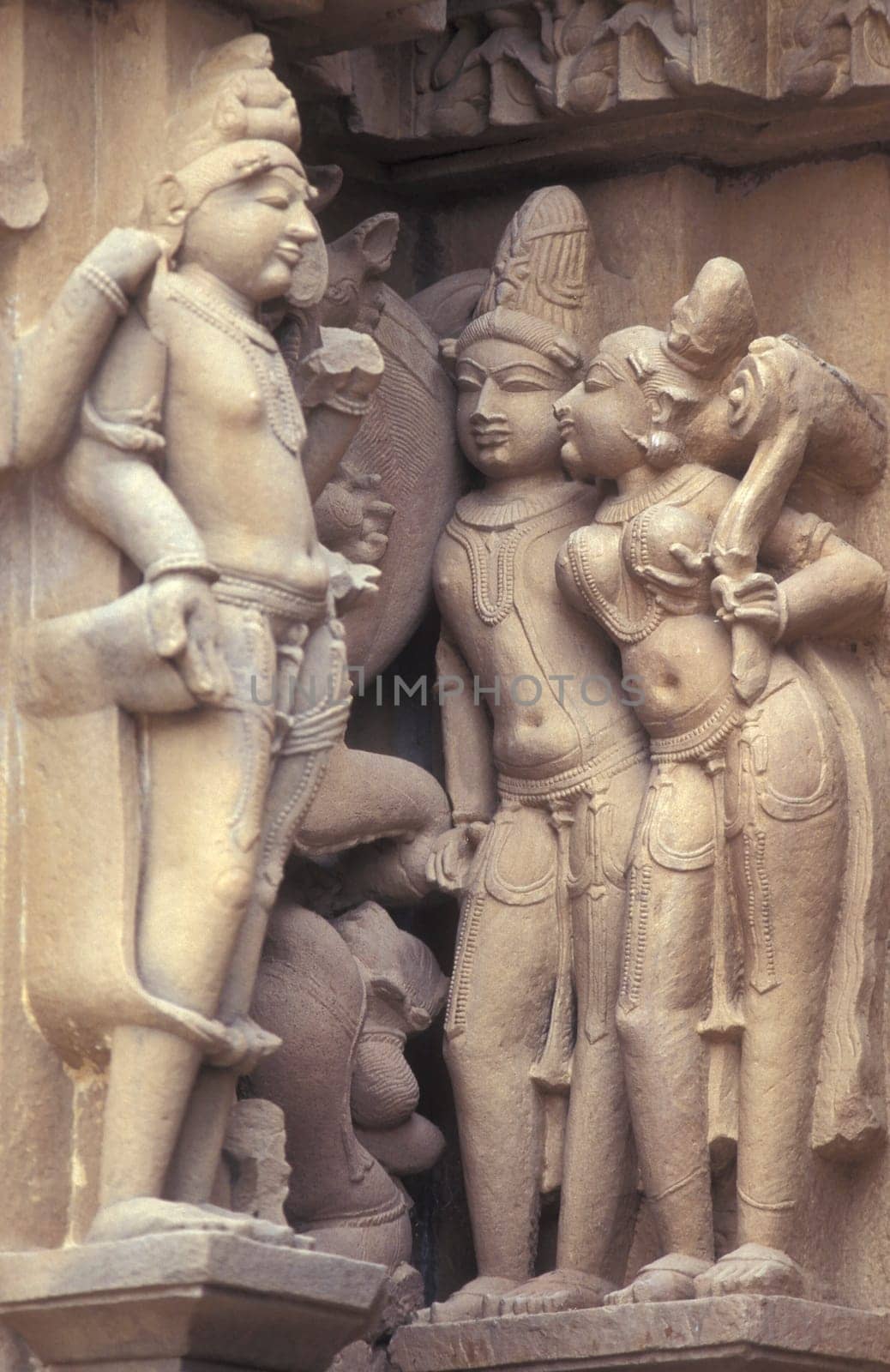Erotic Sculptures at the erotic Temple or Hindu Temple of Kandarija Mahadeva Temple in the city of Khajurao in Province Madhya Pradesh in India.  India, Khajurao, April, 1998