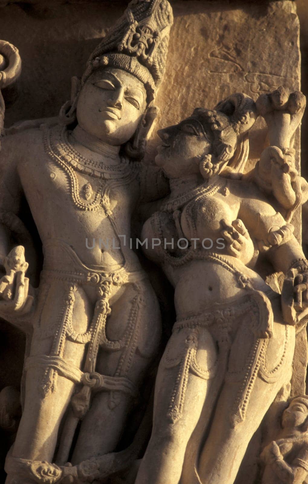 Erotic Sculptures at the erotic Temple or Hindu Temple of Kandarija Mahadeva Temple in the city of Khajurao in Province Madhya Pradesh in India.  India, Khajurao, April, 1998