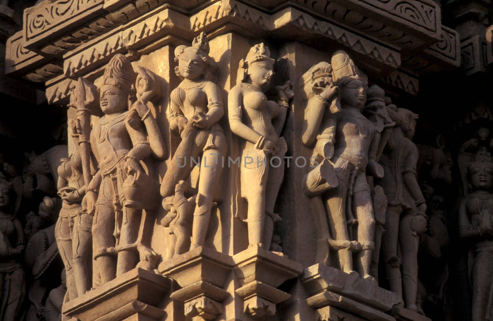 Erotic Sculptures at the erotic Temple or Hindu Temple of Kandarija Mahadeva Temple in the city of Khajurao in Province Madhya Pradesh in India.  India, Khajurao, April, 1998