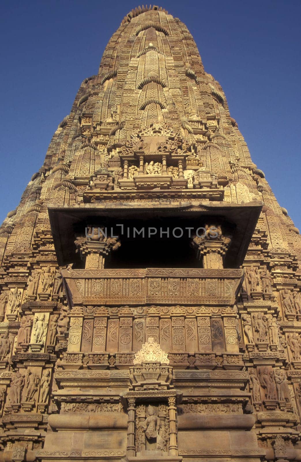 a view of the Erotic Temple and Hindu Temple of Kandarija Mahadeva Temple in the city of Khajurao in Province Madhya Pradesh in India.  India, Khajurao, April, 1998
