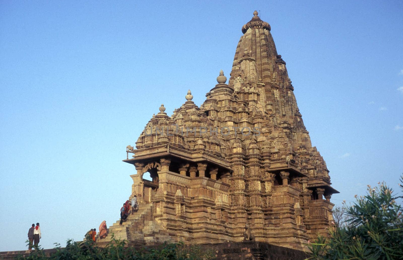 a view of the Erotic Temple and Hindu Temple of Kandarija Mahadeva Temple in the city of Khajurao in Province Madhya Pradesh in India.  India, Khajurao, April, 1998