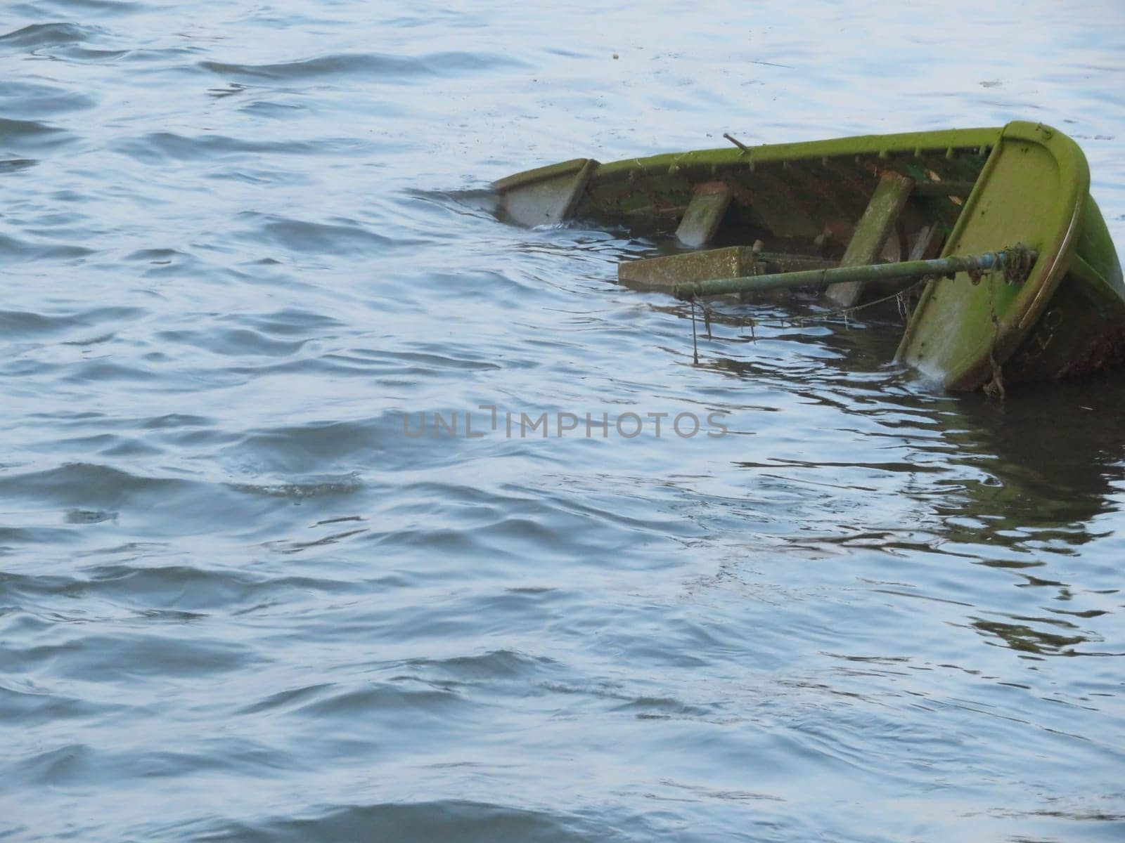 old ancient boat sunken in poor condition abandoned