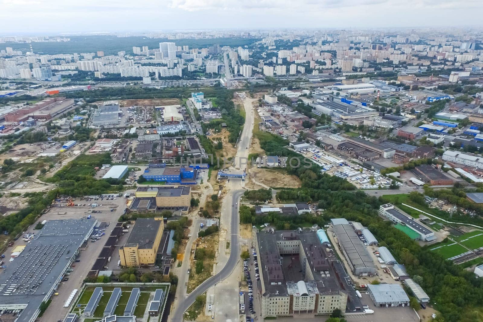 Top view of the city of Moscow, buildings and roads and other infrastructure of the city. Cityscape view from above.