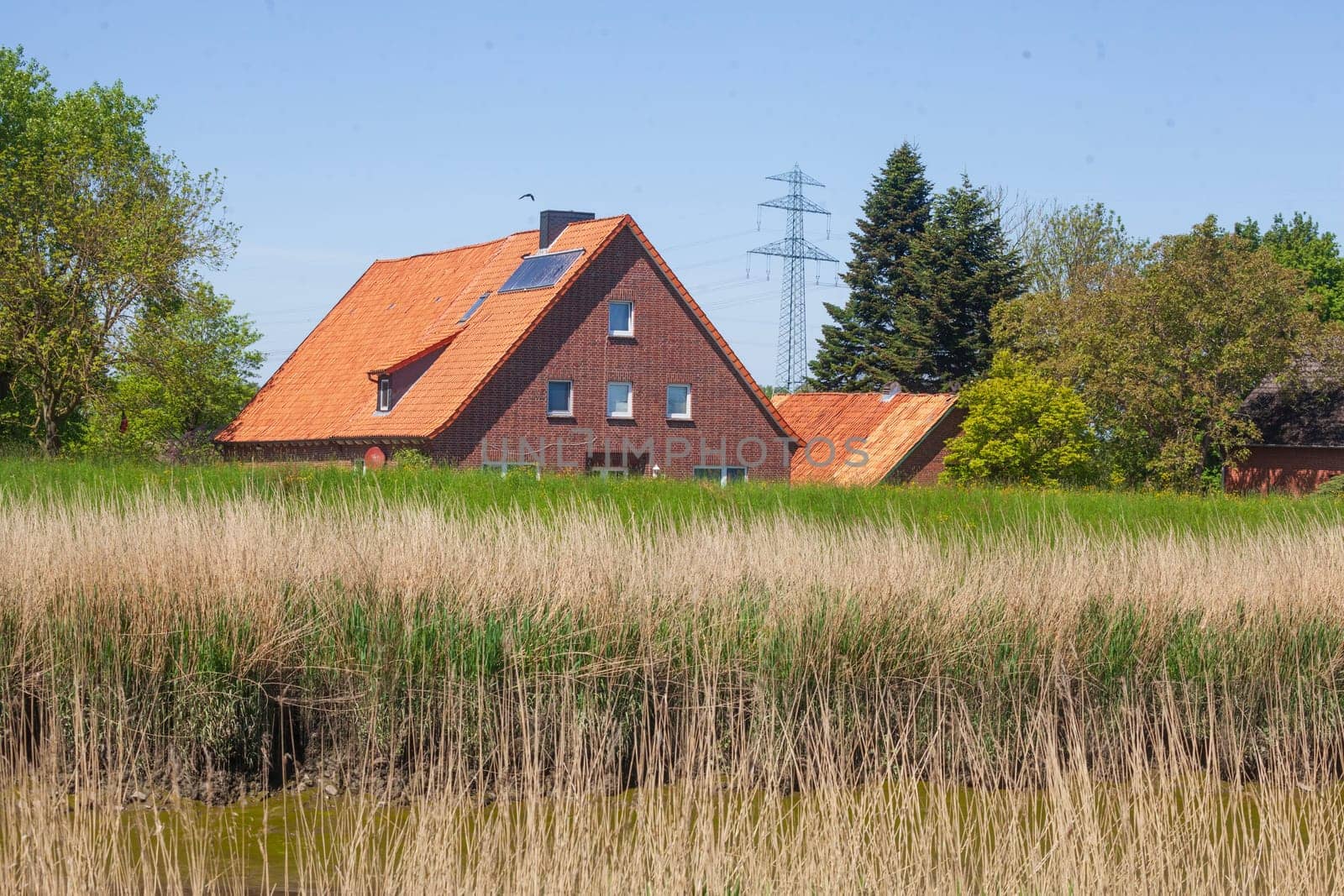 Brick residential building on the River Este, Buxtehude, Lower Saxony, Germany