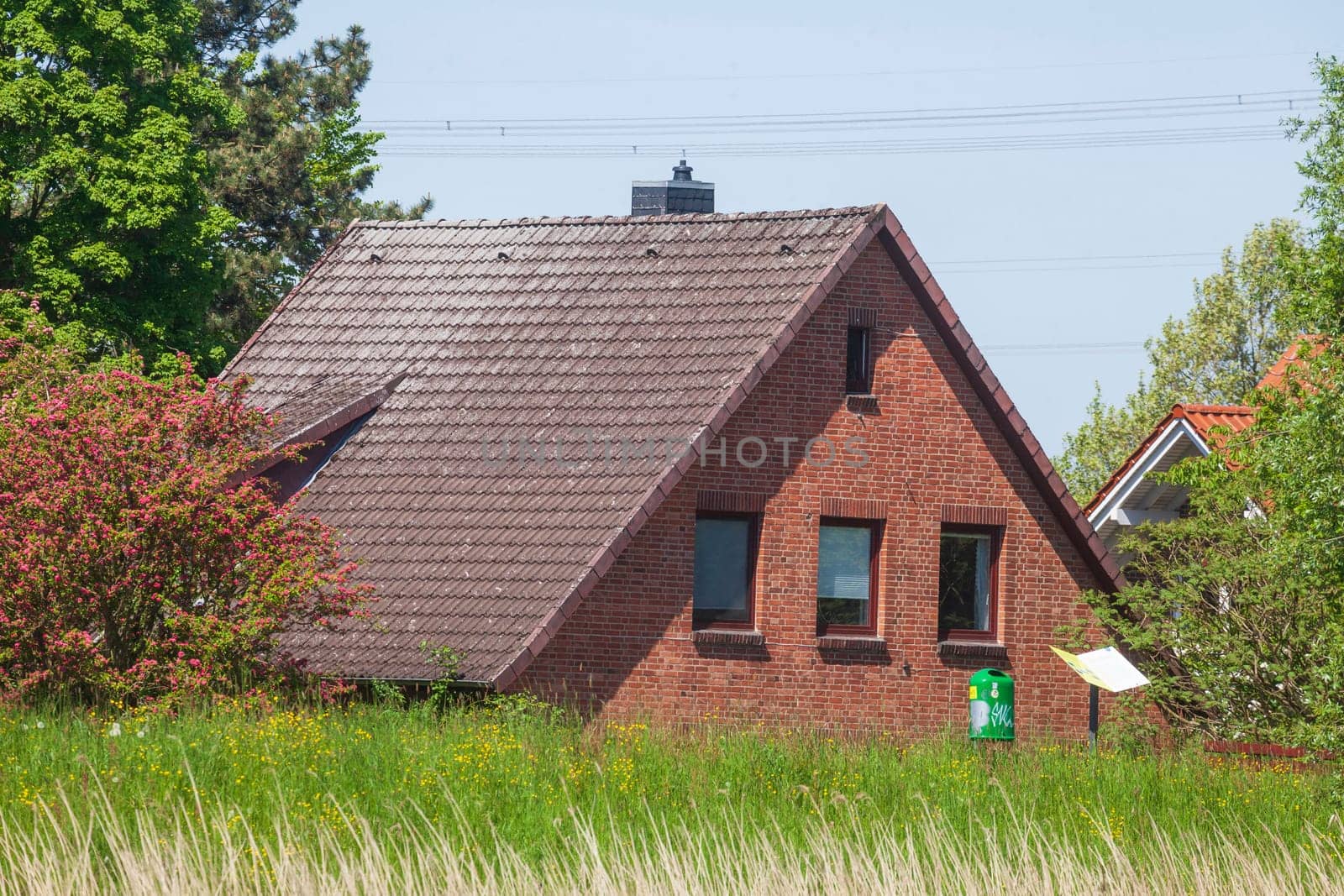 Brick residential building on the River Este, Buxtehude, Lower Saxony, Germany