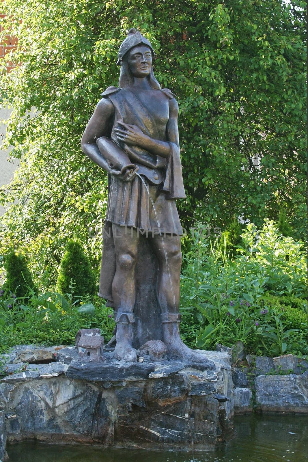 Saint Florian, statue in the garden of the church of Saints Peter and Paul in Kasina, Croatia