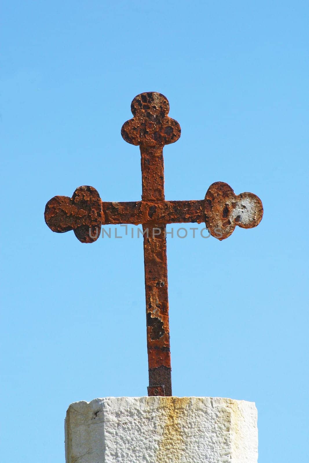 Iron cross in front of the parish church of Saint Jerome in Lun, island of Pag, Croatia