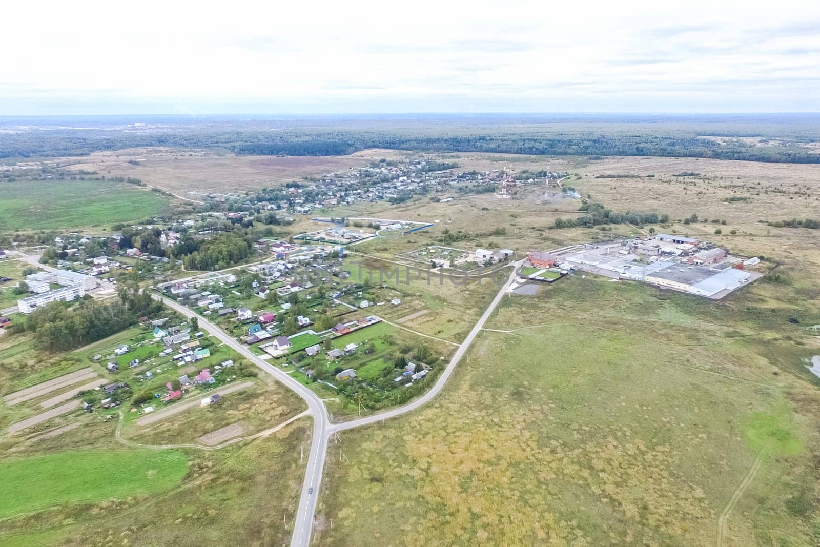 Top view of the village, fields and forests near the village