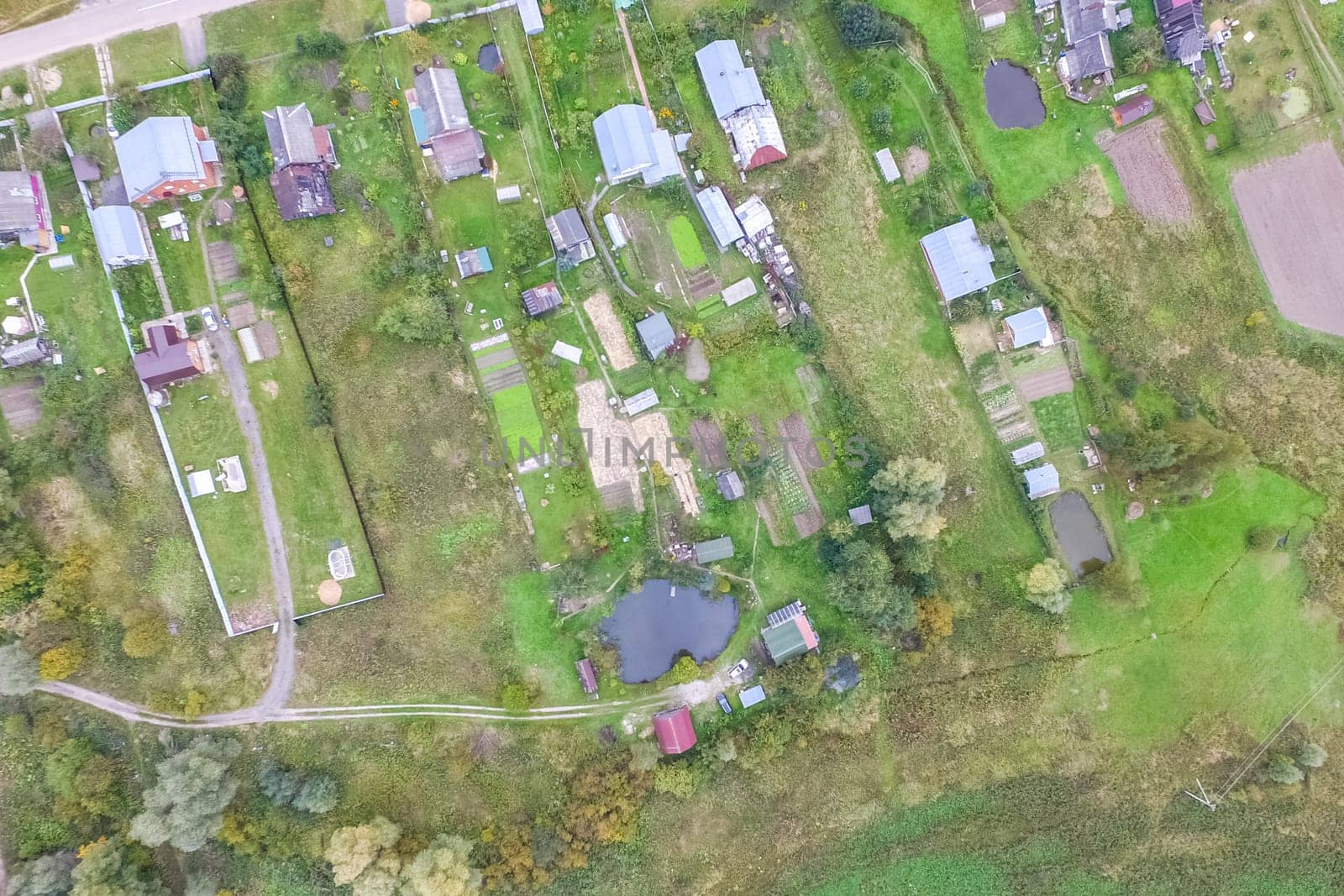 Top view of the village, fields and forests near the village