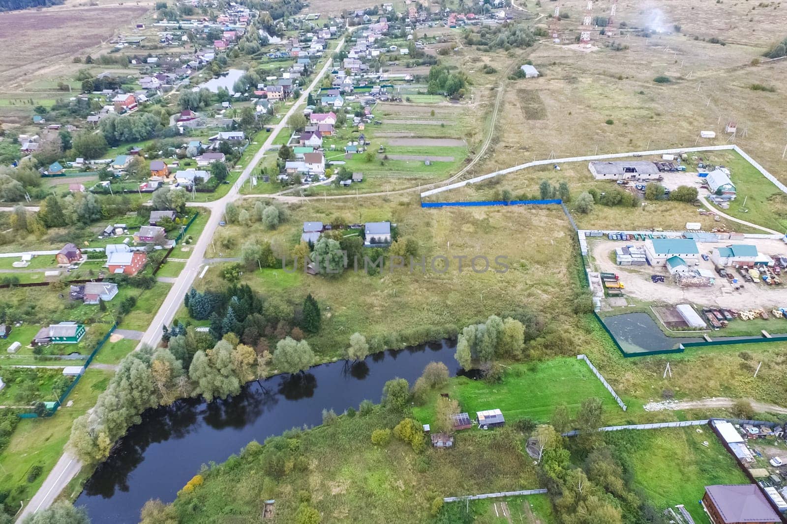 Top view of the village, fields and forests near the village