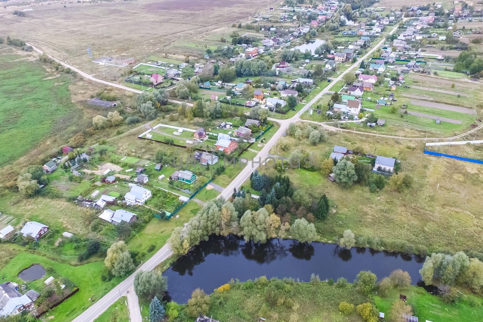 Top view of the village, fields and forests near the village