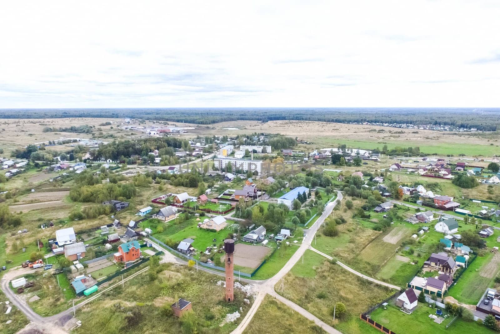 Top view of the village, fields and forests near the village