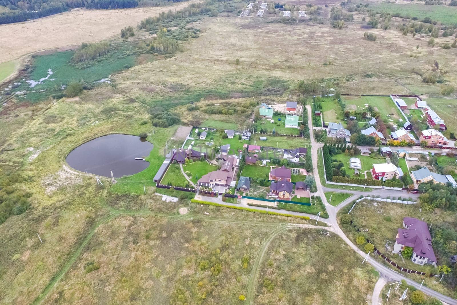 Top view of the village, fields and forests near the village