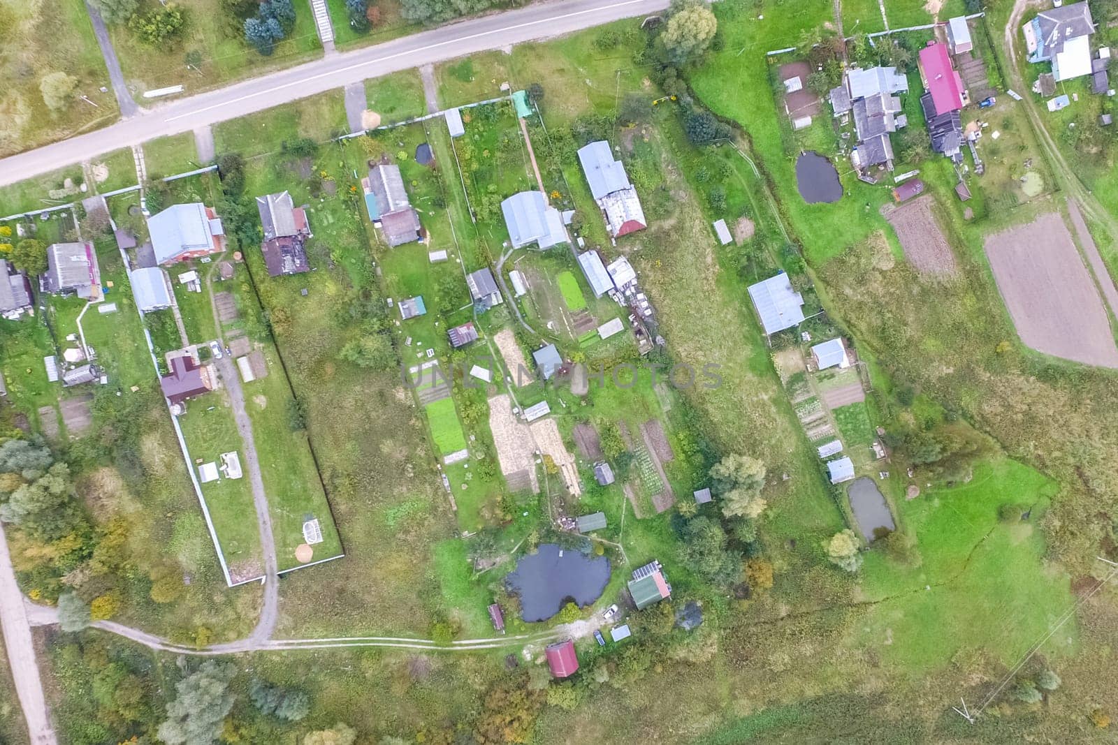 Top view of the village, fields and forests near the village