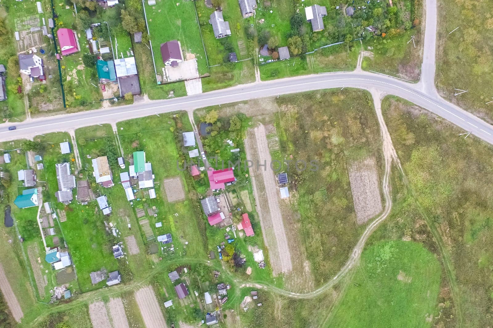 Top view of the village, fields and forests near the village